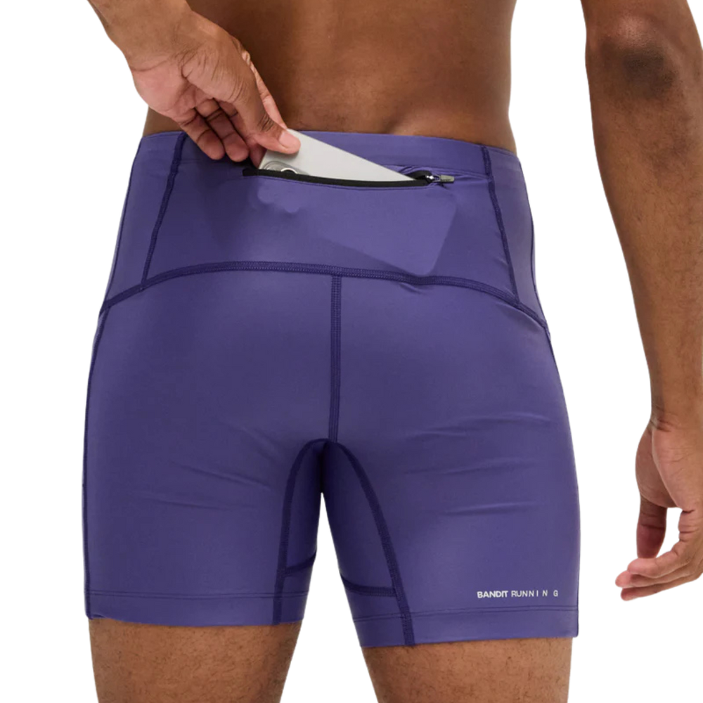Purple athletic shorts with a pocket on a white background