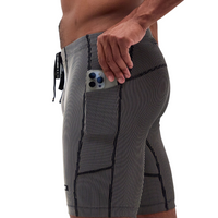 Bandit Running Striped Cadence™ 7 Pocket Half Tights - Black with Chalk